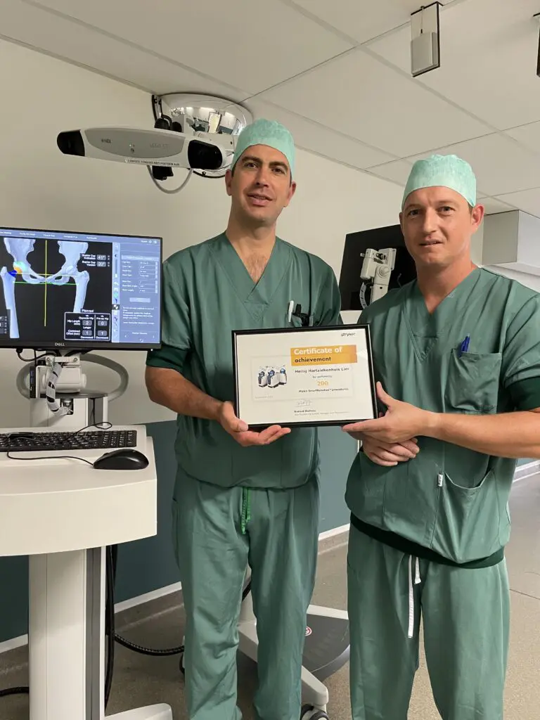 dr Myncke en dr Van Opstal ontvangen een certificaat